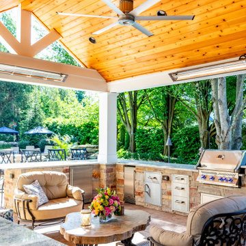 Pool Side Covered Patio with Fireplace and Bar Area