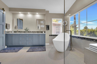 Inspiration for a large master double-sink bathroom remodel with shaker cabinets, blue cabinets, quartz countertops, white countertops and a built-in vanity