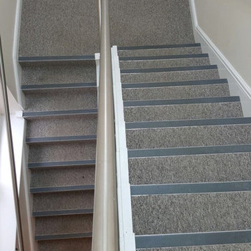 Grey Carpet to Stairs With Black Nosings