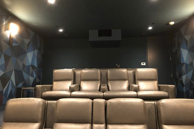 Inspiration for a contemporary home theater remodel