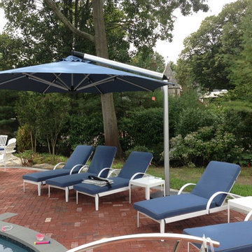 Chaise Lounges and Umbrella for Pool Area
