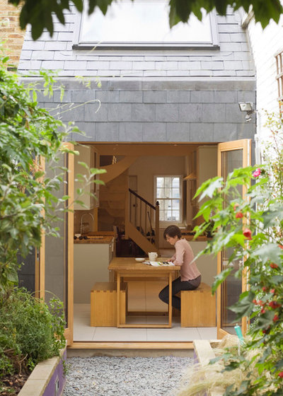 Contemporary Dining Room by Alma-nac