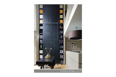 Photo of a medium sized home office in London with a reading nook, beige walls, medium hardwood flooring and brown floors.