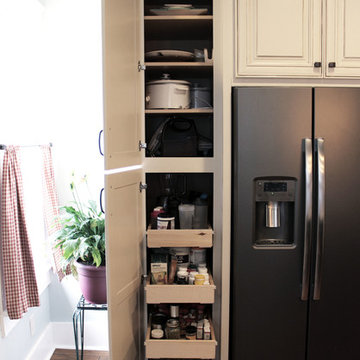 Painted Cream with Brown Glaze Cabinets with Giallo Granite Countertops ~ Sevill