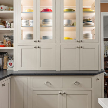 Warm Traditional Kitchen Remodel with Cream Cabinets & Herringbone Floors