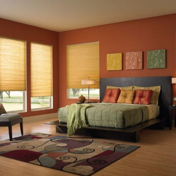 Motorized light-filtering cellular shades.