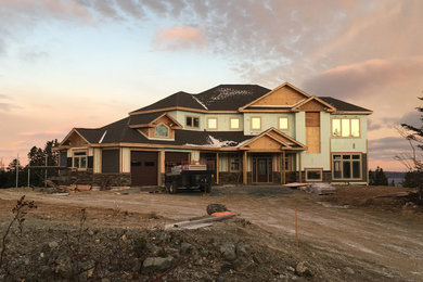 Example of a large classic home design design in Other
