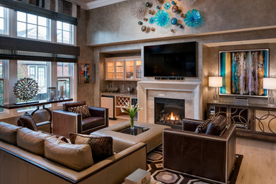 Photo of a mid-sized contemporary formal enclosed living room in San Francisco with brown walls, light hardwood floors, a standard fireplace, a stone fireplace surround and a wall-mounted tv.