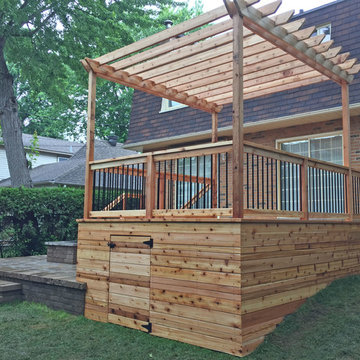 Western Red Cedar Deck with Cedar Pergola & Stone Patio & Stone Fireplace