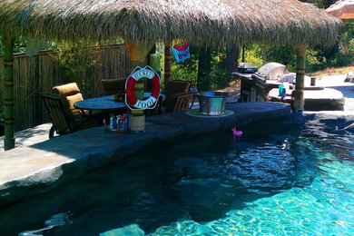 Example of a large backyard custom-shaped pool design in Sacramento