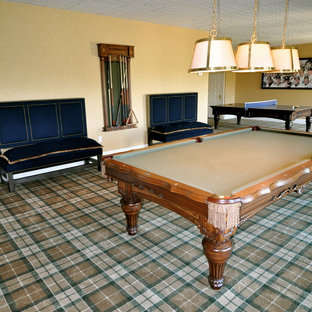 Inspiration for a mediterranean fully buried basement in New York with beige walls and carpet.