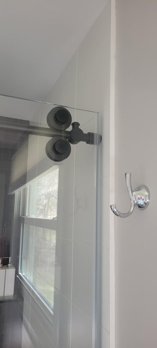 Sliding shower door installed backward?