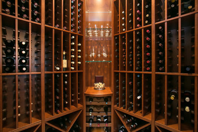 Example of a small classic wine cellar design in San Diego