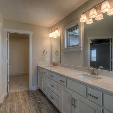Custom Newport w/ side-load garage and master w/ sitting room