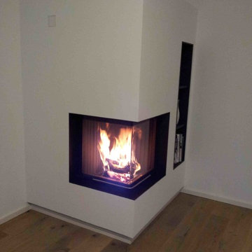 Kaminanlage Eck mit Holzfach