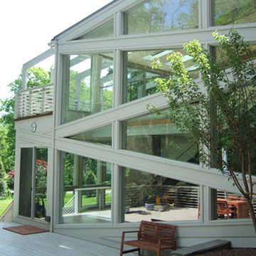 Greenwich modern home with Le Corbusier Villa Savoye inspired ramp