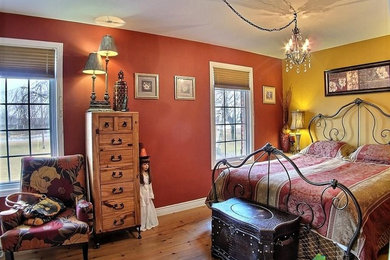 Example of a cottage chic bedroom design in Toronto