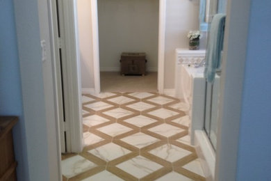 Inspiration for a timeless closet remodel in San Diego