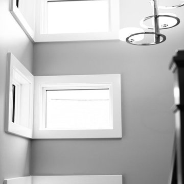 stairway windows and chandelier
