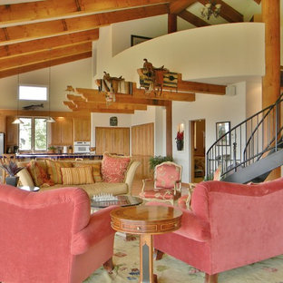 Design ideas for a mediterranean living room in Seattle with white walls.