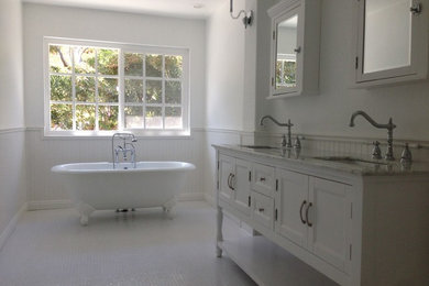 Inspiration for a mid-sized transitional master gray tile and yellow tile mosaic tile floor and white floor bathroom remodel in San Diego with furniture-like cabinets, white cabinets, white walls, an undermount sink, marble countertops, a one-piece toilet and a hinged shower door