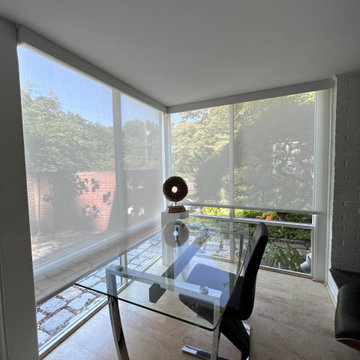 Solar shades in corner windows