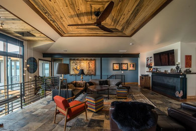 Example of an arts and crafts living room design in Denver
