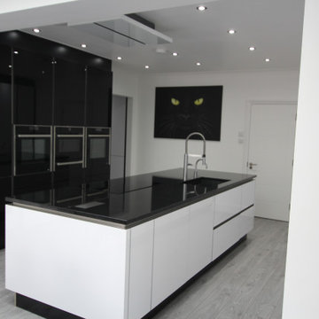 Hacker German made kitchen by Hampdens KB in white and black christall gloss