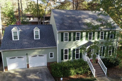 Traditional two-story concrete fiberboard and clapboard exterior home idea in Raleigh