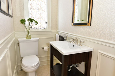 Example of a small trendy 3/4 beige tile and porcelain tile porcelain tile bathroom design in Chicago with open cabinets, dark wood cabinets, a one-piece toilet, beige walls, an integrated sink and solid surface countertops