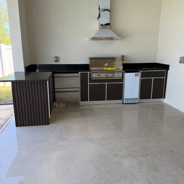 Modern Outdoor Kitchen in Cape Coral, FL | Custom Aluminum & StarBoard Design