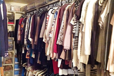 Inspiration for a mid-sized gender-neutral walk-in closet remodel in Austin