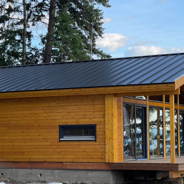 Modern Wood Cabin with Expansive Windows