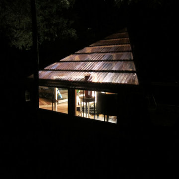 Wolfe's Den Treehouse at night