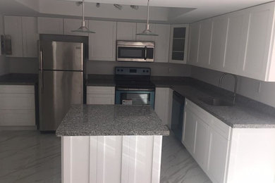 Minimalist kitchen photo in Miami
