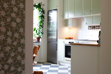 ヨーテボリにあるミッドセンチュリースタイルのおしゃれなキッチンの写真
