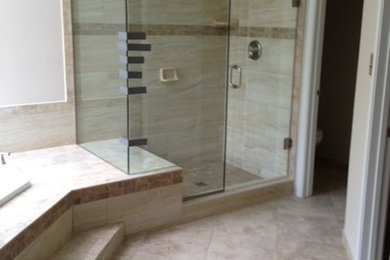 Photo of a bathroom in DC Metro with granite benchtops, ceramic tile, beige walls and ceramic floors.