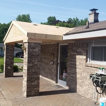 Covered Porch Reconstruction & Roof Replacement During