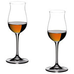 Riedel - Riedel Vinum Cognac Hennessy Glass - Set of 2 - Different opinions on the ideal cognac glass are as old as the drink itself. Even today, cognac is mainly served in wide tulip-shaped glasses - in spite of the disadvantages which this traditional shape has for the enjoyment of cognac. The differences in color, aroma and taste are the features by which the quality of a cognac is judged. The finely tuned shape of this glass harmonises the aroma and the taste, tempering the alcohol and the stringency of the palate and emphasizing the bouquet. The flute-shaped glass allows its contents a very small evaporation surface. You will be surprised to detect no pungent fumes but delicately balanced aromas reminiscent of a summer meadow. Recommended for: Armagnac (mature), Armagnac (young), Brandy, Calvados, Cognac V.S.O.P., Cognac XO, Rum, V.S.O.P. Cognac, XO Cognac