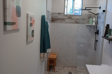 Inspiration for a large contemporary 3/4 white tile and stone slab porcelain tile, multicolored floor, single-sink, tray ceiling and wood wall bathroom remodel in San Francisco with shaker cabinets, black cabinets, a one-piece toilet, an undermount sink, quartz countertops, white countertops and a freestanding vanity
