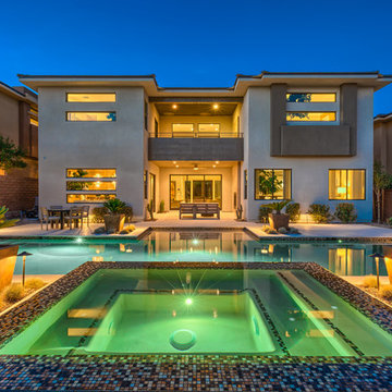 Lap Pool with Rim Flow Spa & Fire Pit