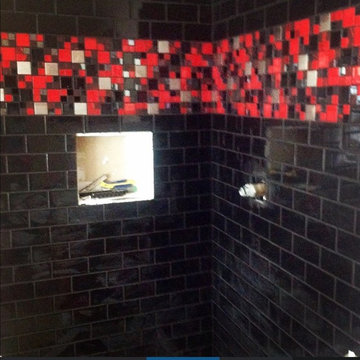 McAndrew Residence: Red, Black, and Stainless Glass Tile Bathroom