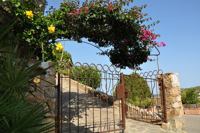 Home design - coastal home design idea in Cagliari