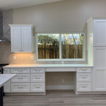 CHILDREN'S DESK AREA LOCATED IN THE OPEN AREA & AWAY FROM DINNER PREP