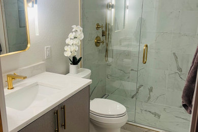 Inspiration for a mid-sized contemporary 3/4 white tile and ceramic tile single-sink doorless shower remodel in Seattle with flat-panel cabinets, beige cabinets, quartz countertops, a hinged shower door, white countertops and a built-in vanity