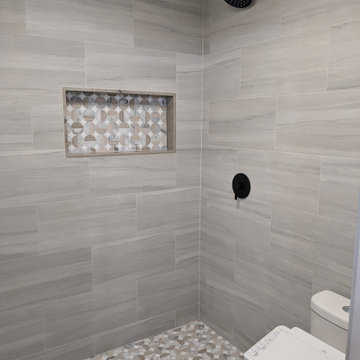 Modern Curbless Walk-In Shower & Bidet Suite with Geometric Tile