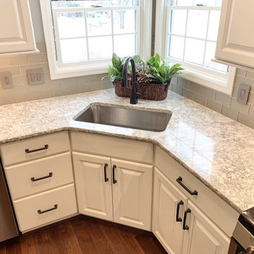 Open Concept Remodel in Rock Island With Walls Removed and a Custom Entry Bench