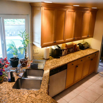 Angled Wall Transforms Corridor Kitchen