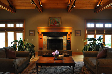 Inspiration for a huge contemporary open concept light wood floor living room remodel in Portland with green walls, a tile fireplace and a media wall