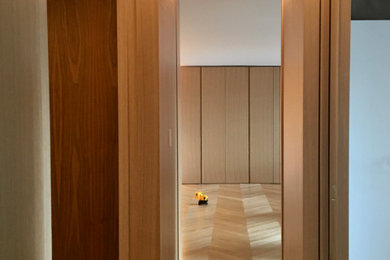 Example of a small minimalist hallway design in New York